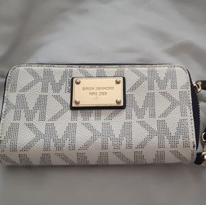 Michael kors wallet off white or cream color and blue strap